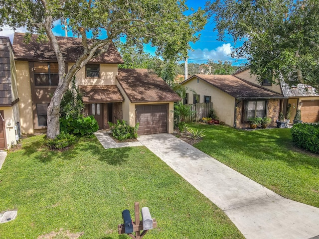 view of front facade featuring a front yard and a garage