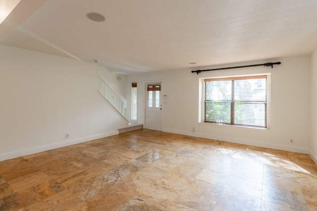 interior space with a textured ceiling