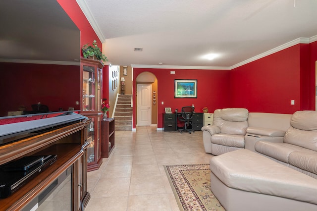 living room with ornamental molding and light tile patterned flooring