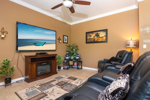 living room with ornamental molding, ceiling fan, and light tile patterned floors