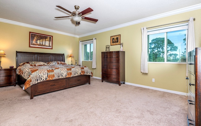 carpeted bedroom with ceiling fan, ornamental molding, and multiple windows