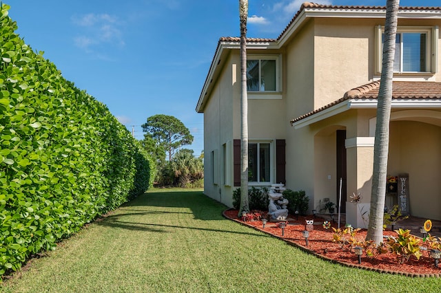 exterior space with a lawn