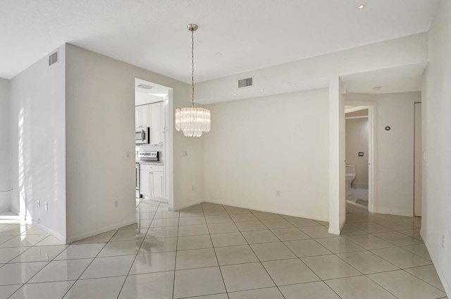 unfurnished dining area featuring light tile patterned floors and a chandelier