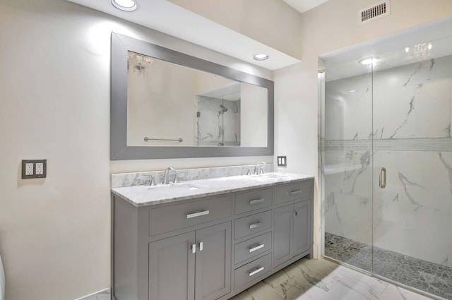 bathroom with vanity and walk in shower