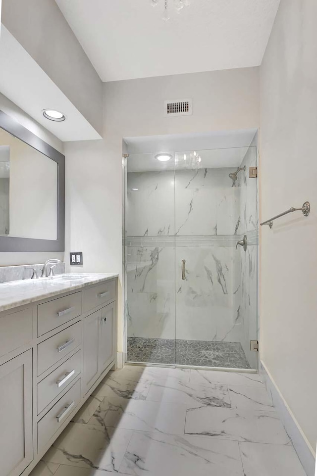 bathroom featuring vanity and walk in shower