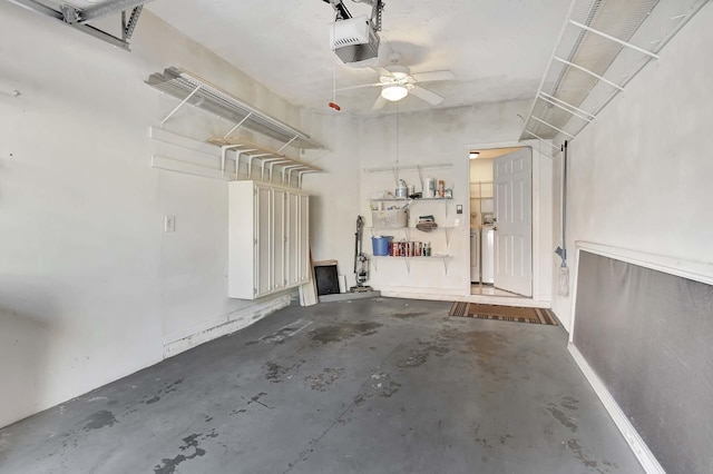 garage featuring ceiling fan and a garage door opener