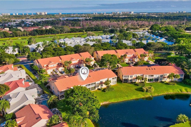 drone / aerial view featuring a water view