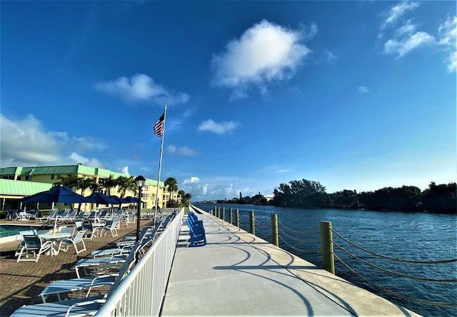 dock area with a water view