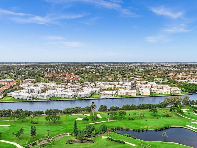 drone / aerial view featuring a water view and golf course view