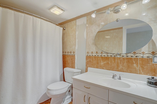 bathroom featuring vanity, tile walls, toilet, and a shower with shower curtain