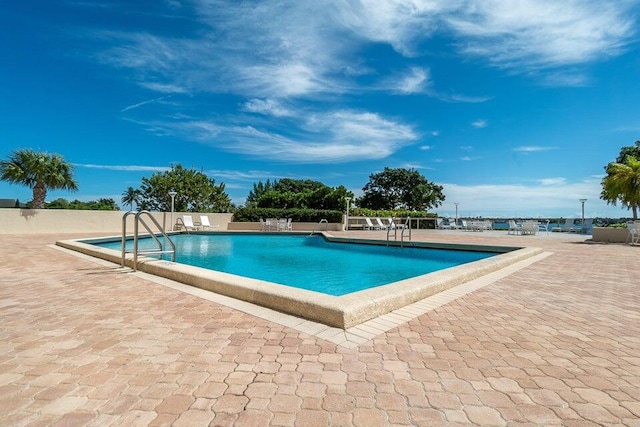 view of pool featuring a patio area