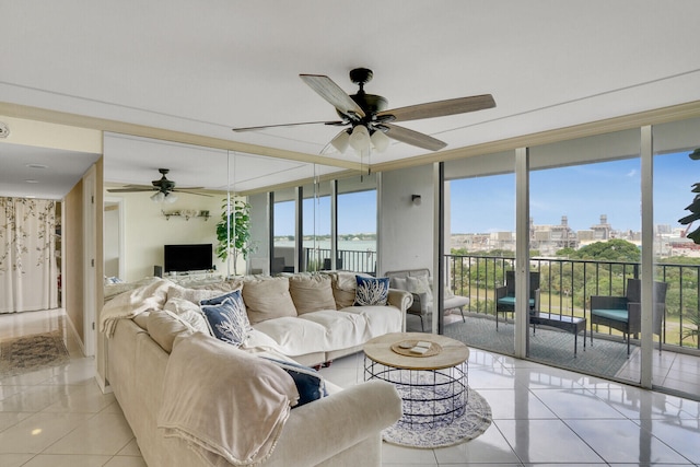 living room with light tile patterned flooring, plenty of natural light, and expansive windows