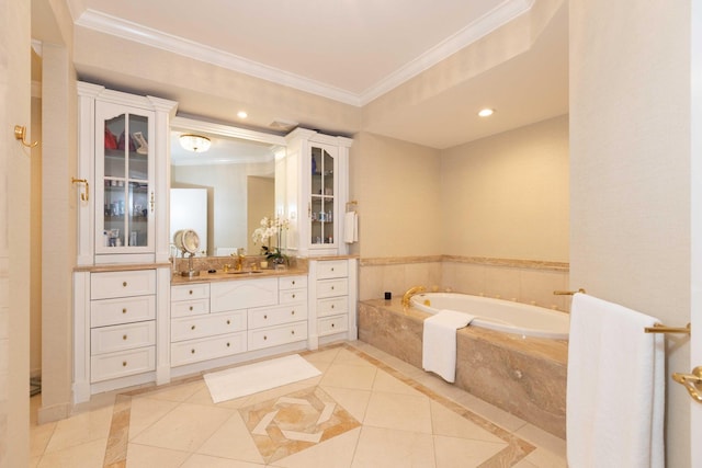 bathroom with ornamental molding, tiled bath, vanity, and tile patterned floors