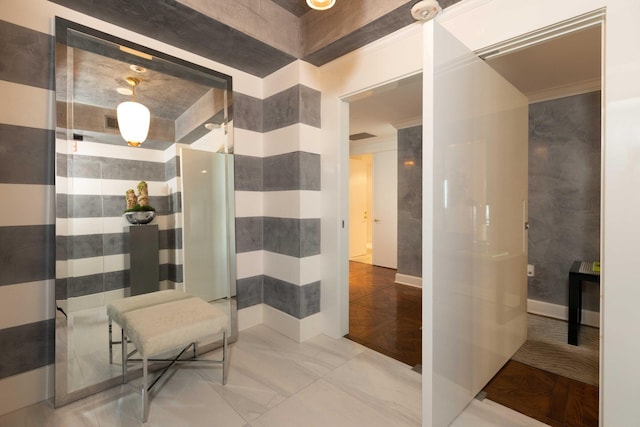 bathroom featuring ornamental molding