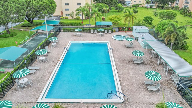 view of swimming pool featuring a patio area