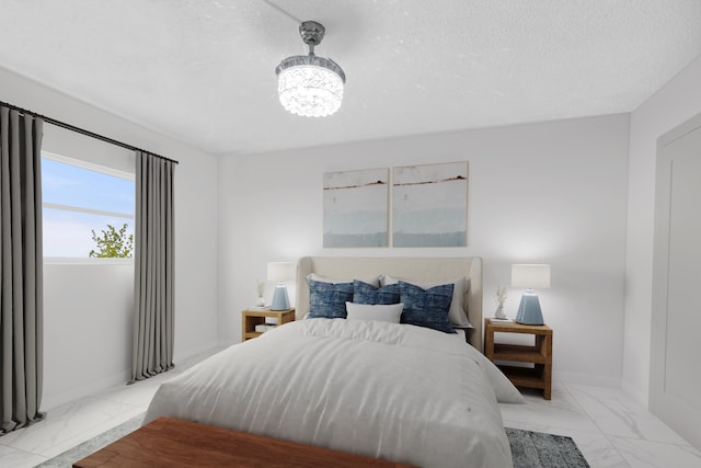 bedroom featuring a textured ceiling