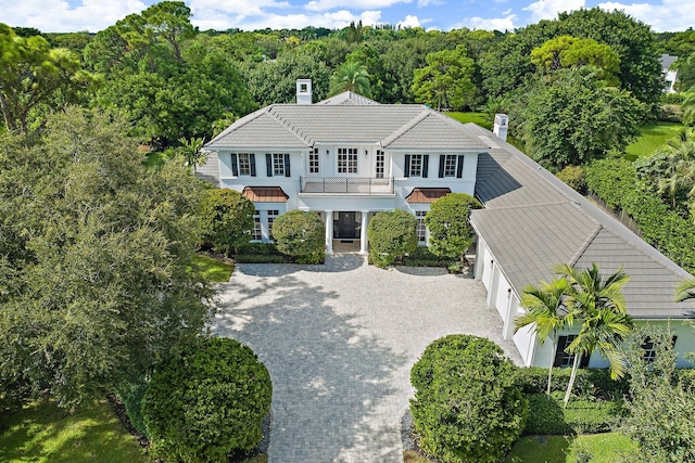 view of front of home with a balcony