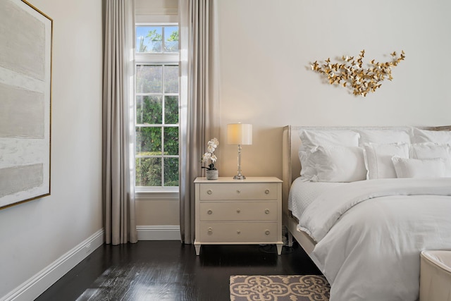 bedroom featuring dark wood-type flooring