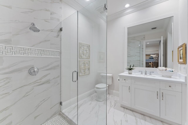 bathroom with an enclosed shower, vanity, crown molding, and toilet