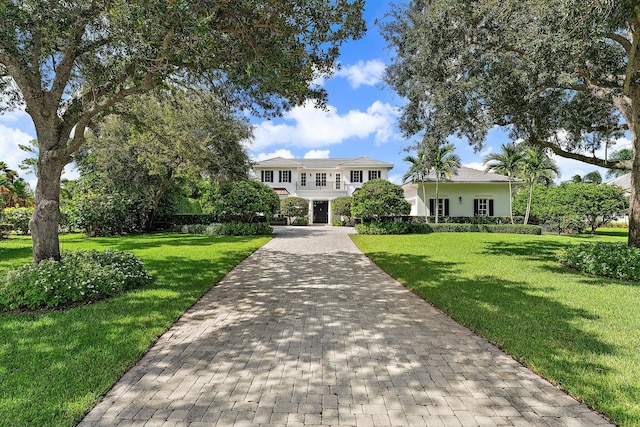 view of front of home with a front yard