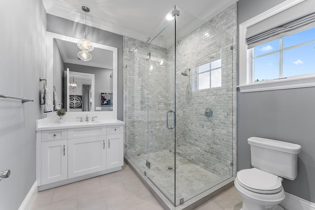 bathroom with tile patterned floors, vanity, toilet, walk in shower, and ornamental molding