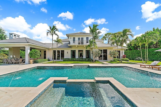 view of swimming pool featuring a patio area and pool water feature