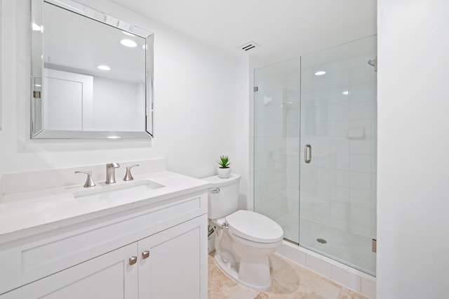 bathroom featuring vanity, toilet, walk in shower, and tile patterned flooring