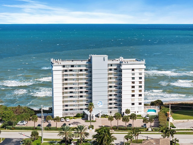 drone / aerial view with a water view