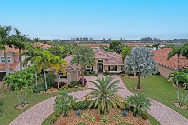 view of front of home with a front lawn