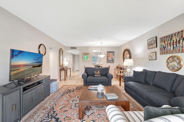 living room with light hardwood / wood-style floors