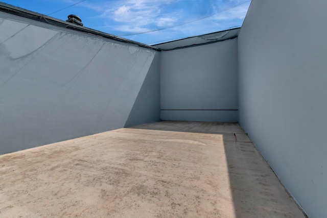 view of patio featuring a balcony