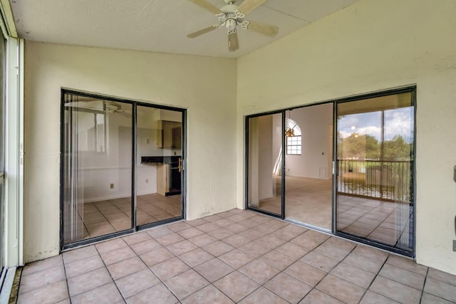 interior space featuring ceiling fan