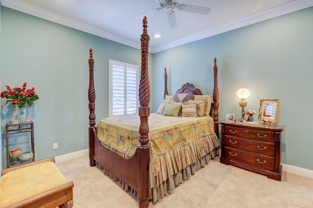 bedroom with ceiling fan, light colored carpet, and crown molding