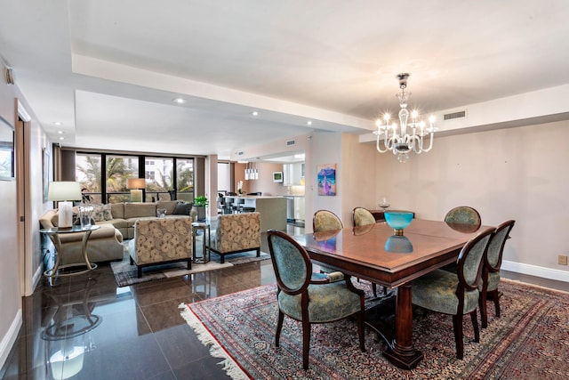 dining area with a notable chandelier