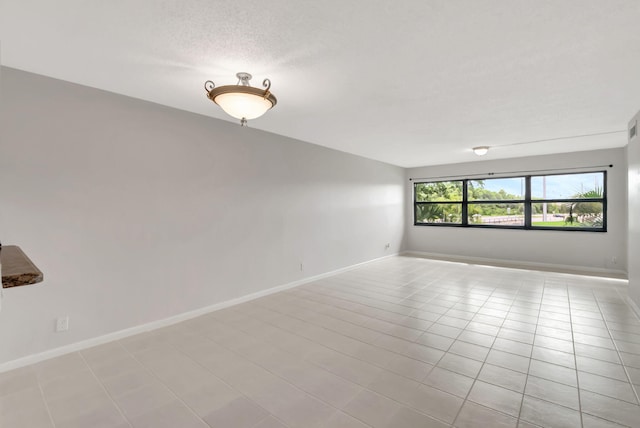 view of tiled spare room