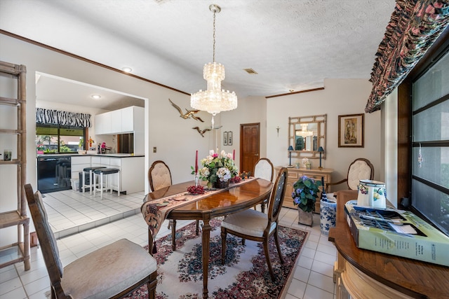 dining area with a textured ceiling, a notable chandelier, and light tile patterned flooring