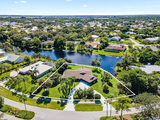 bird's eye view with a water view