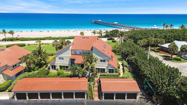 aerial view featuring a water view and a beach view