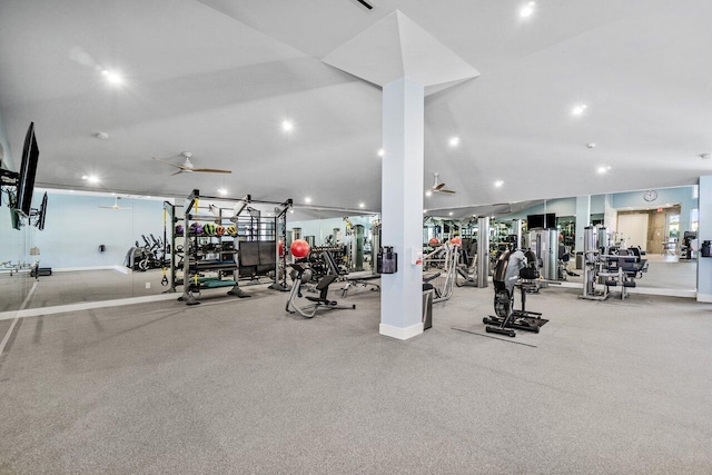 workout area featuring ceiling fan and lofted ceiling