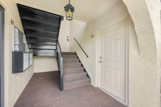 stairway with carpet flooring