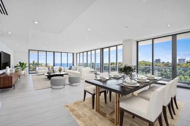 dining room featuring floor to ceiling windows