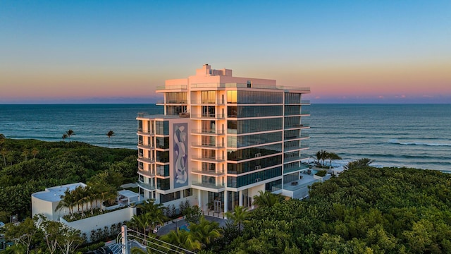 outdoor building at dusk with a water view