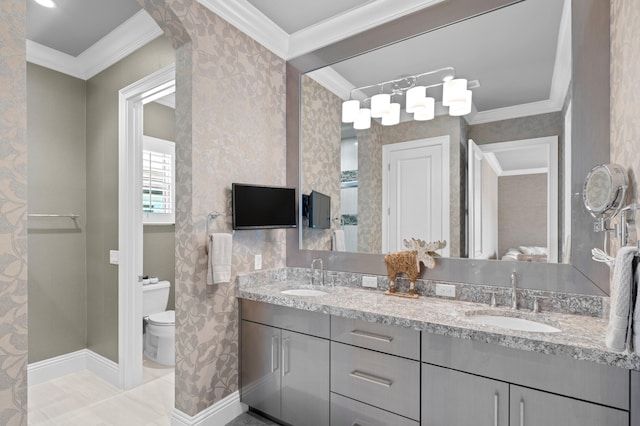 bathroom with toilet, crown molding, and vanity