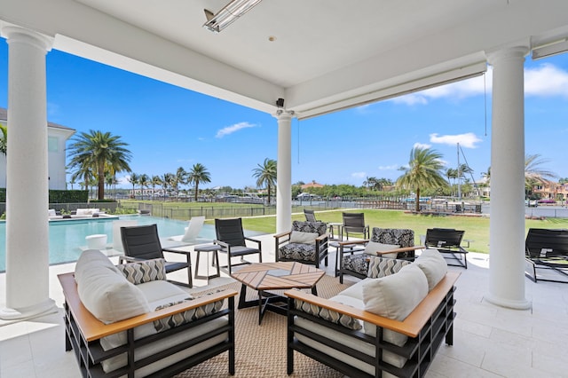 view of patio with a fenced in pool, a water view, and outdoor lounge area