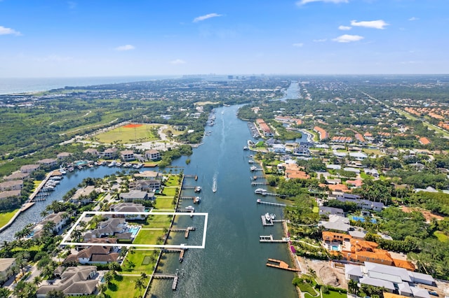 drone / aerial view with a water view