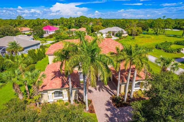 birds eye view of property with a residential view