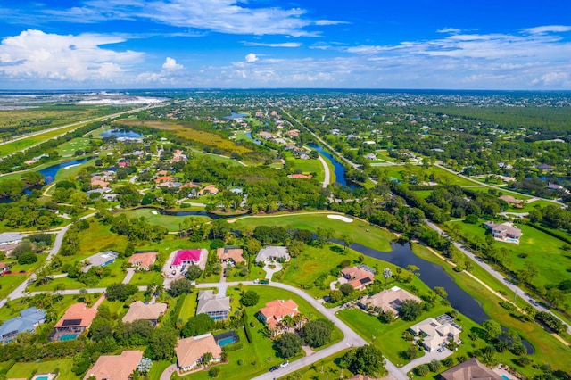 bird's eye view with a water view and a residential view