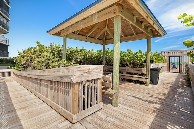 wooden terrace with a gazebo