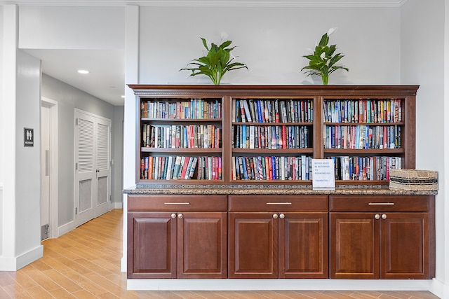 interior details featuring hardwood / wood-style flooring