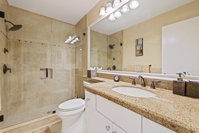 bathroom with walk in shower, tile patterned floors, vanity, and toilet